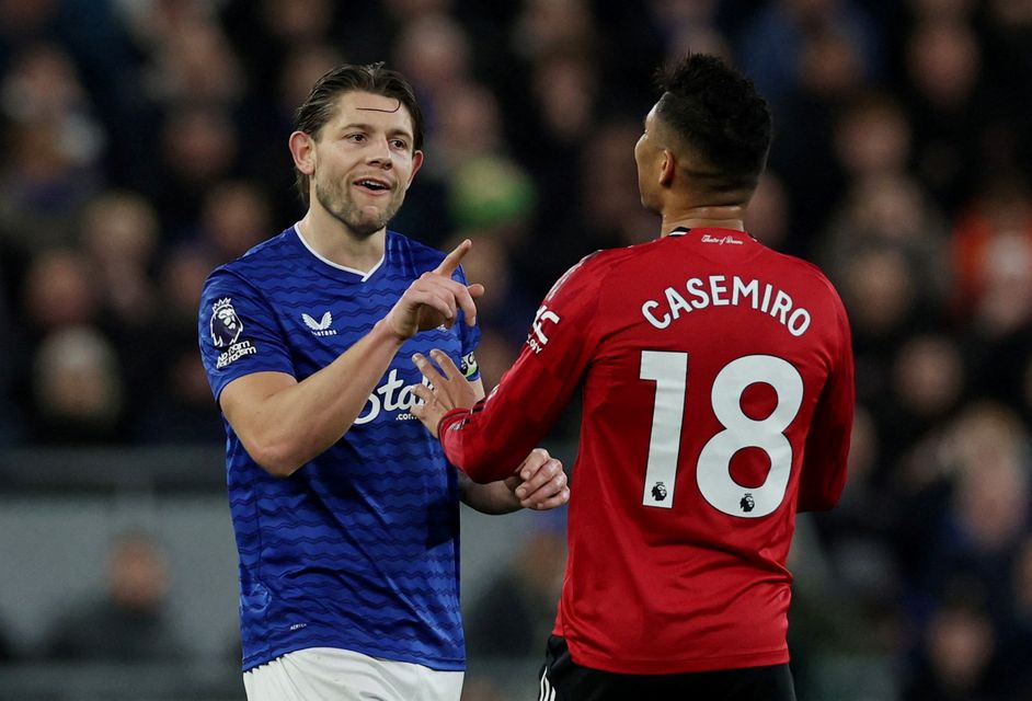 Everton's James Tarkowski clashes with Manchester United's Casemiro. Photo: Reuters